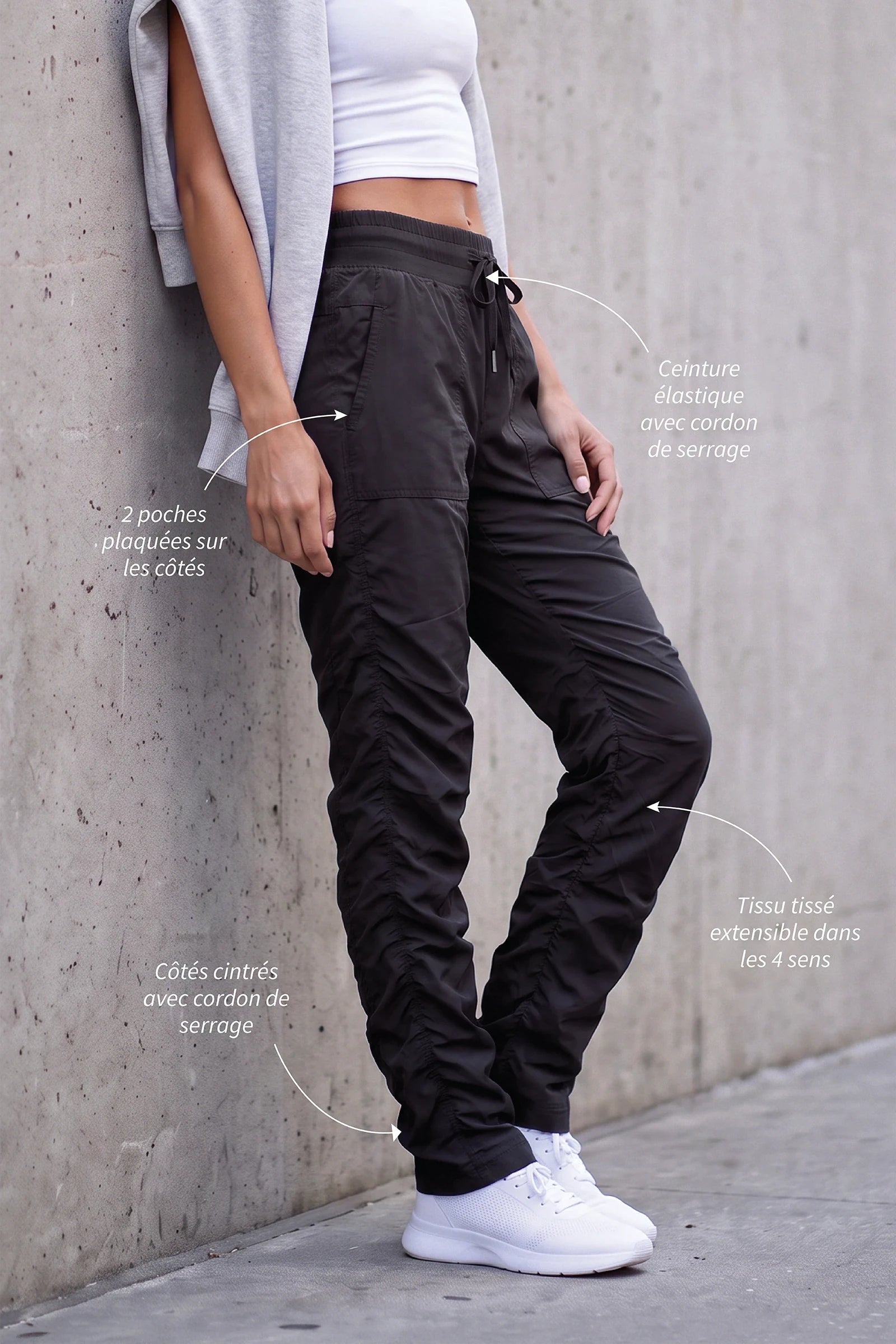 Women’s Black Adventurous Pant, rear product-only view showing the relaxed tapered silhouette and gathered cuffs.