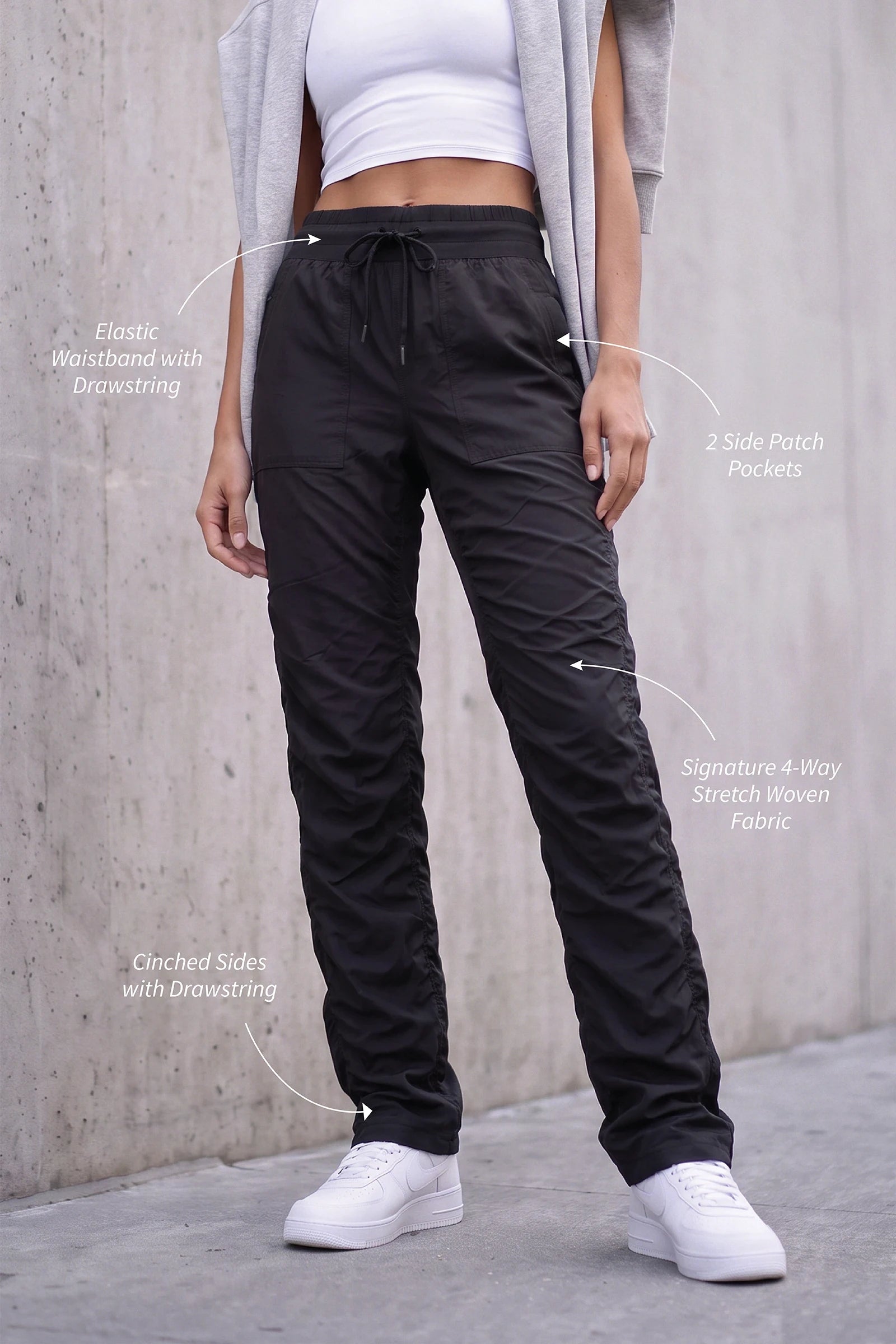 Women’s Black Adventurous Pant, front product-only view showing the drawstring waist and oversized patch pockets.
