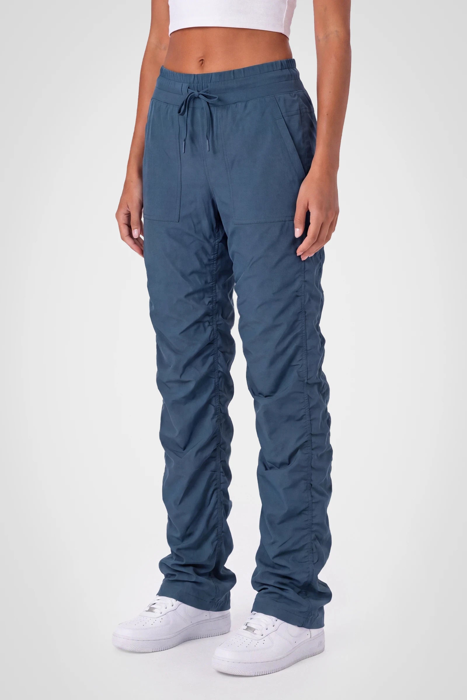 Women’s Key Largo Adventurous Pant, rear studio view showing the relaxed fit through the seat and ankle.
